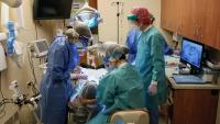 Periodontists performing a procedure